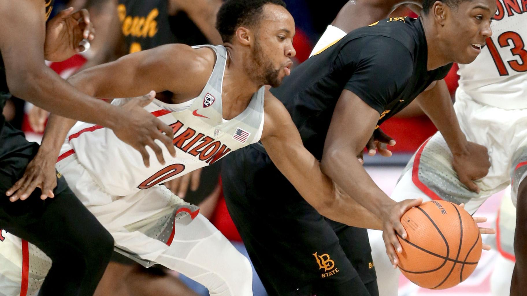 Photos: Arizona cruises past Long Beach State 91-56